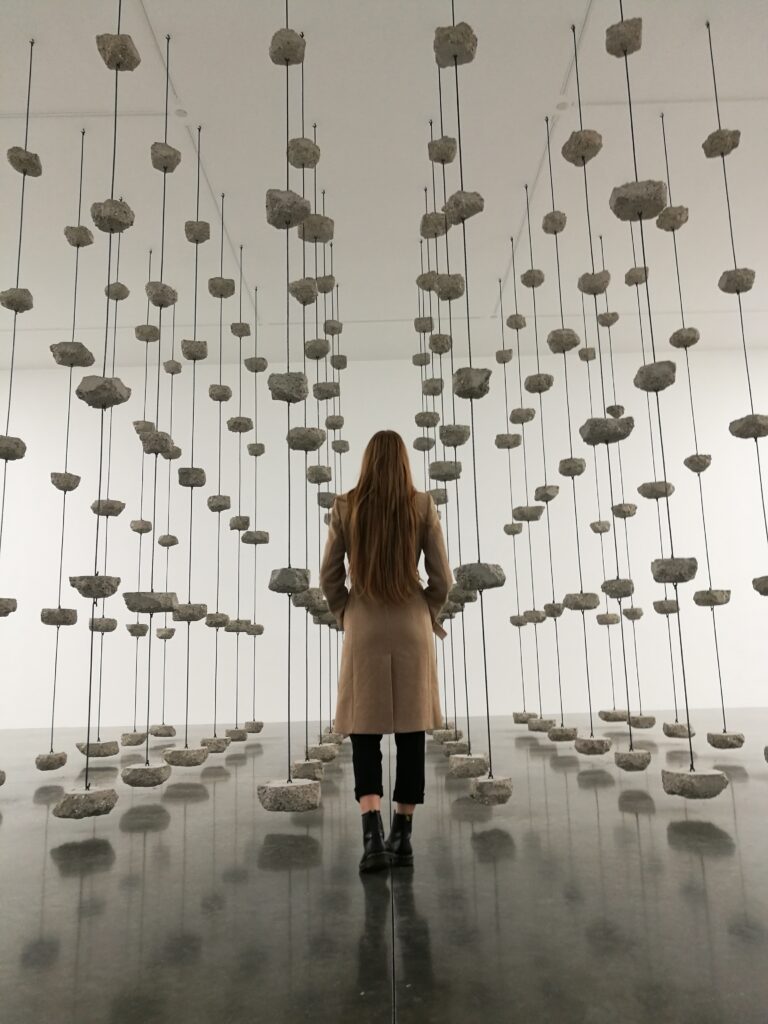 Cristina Ricci in front of Mona Hatoum's artwork at the White Cube