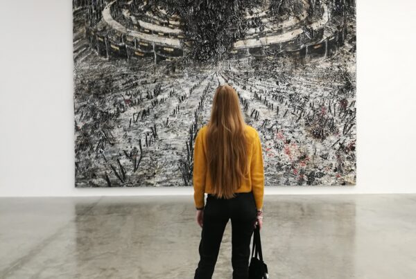 Cristina Ricci in front of Anselm Kiefer's painting at the White Cube